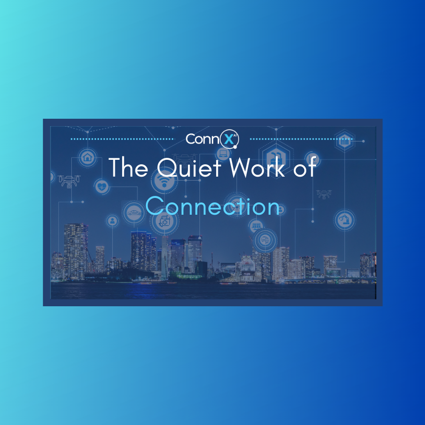 City skyline at night overlaid with connected digital icons representing infrastructure systems, with the title “The Quiet Work of Connection.”